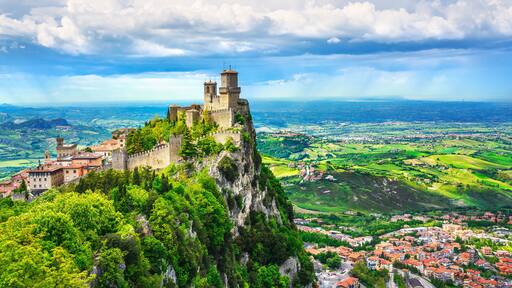 San Marino, medieval tower on a rocky cliff and panoramic view of Romagna