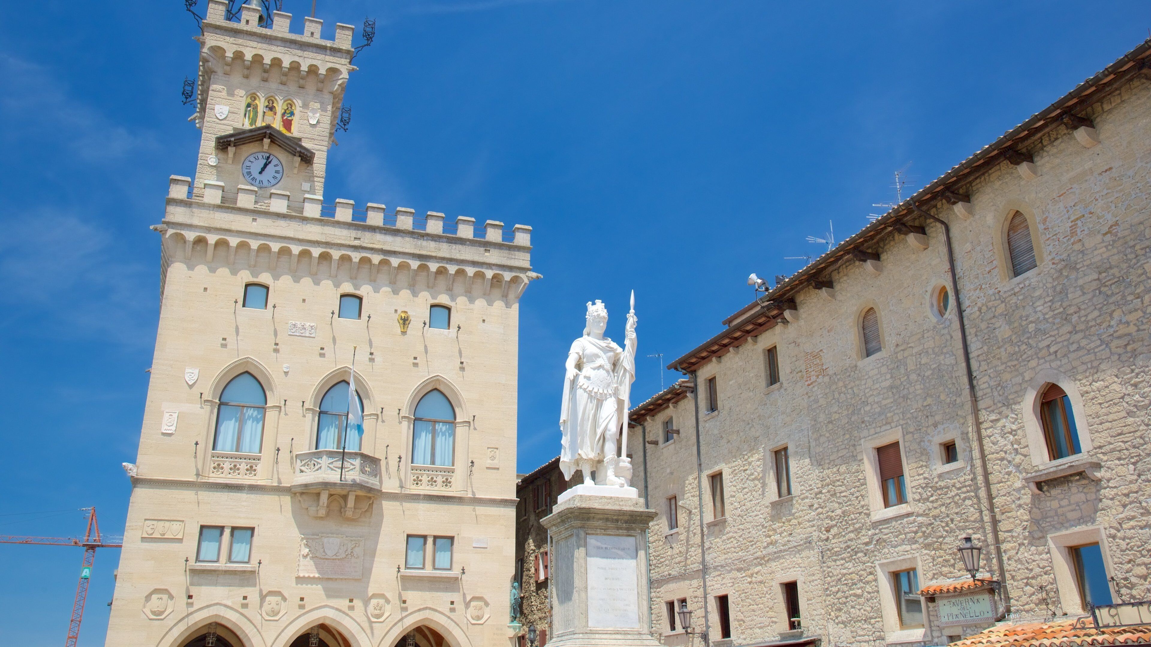Liberty Square showing a city, an administrative buidling and a statue or sculpture