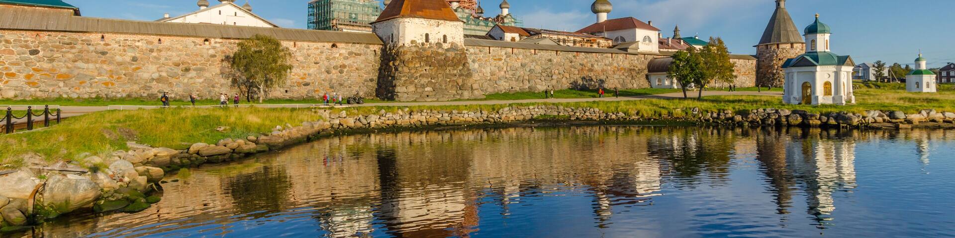 View of the Solovetsky Kremlin in the evening with reflection.