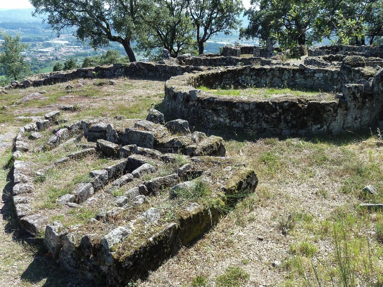 Citânia de Briteiros, a large compound of archaeological ruins of an important proto-historic settlement, which was first inhabited more than 2000 years ago, in the Iron Age.

You can read more of the history here: http://imoutoftheoffice.com/citania-de-briteiros-the-proto-historic-settlement/