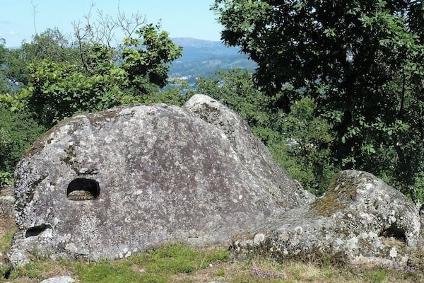 CitĂąnia de Briteiros, a large compound of archaeological ruins of an important proto-historic settlement, which was first inhabited more than 2000 years ago, in the Iron Age.
You can read more of the history here: http://imoutoftheoffice.com/citania-de-briteiros-the-proto-historic-settlement/