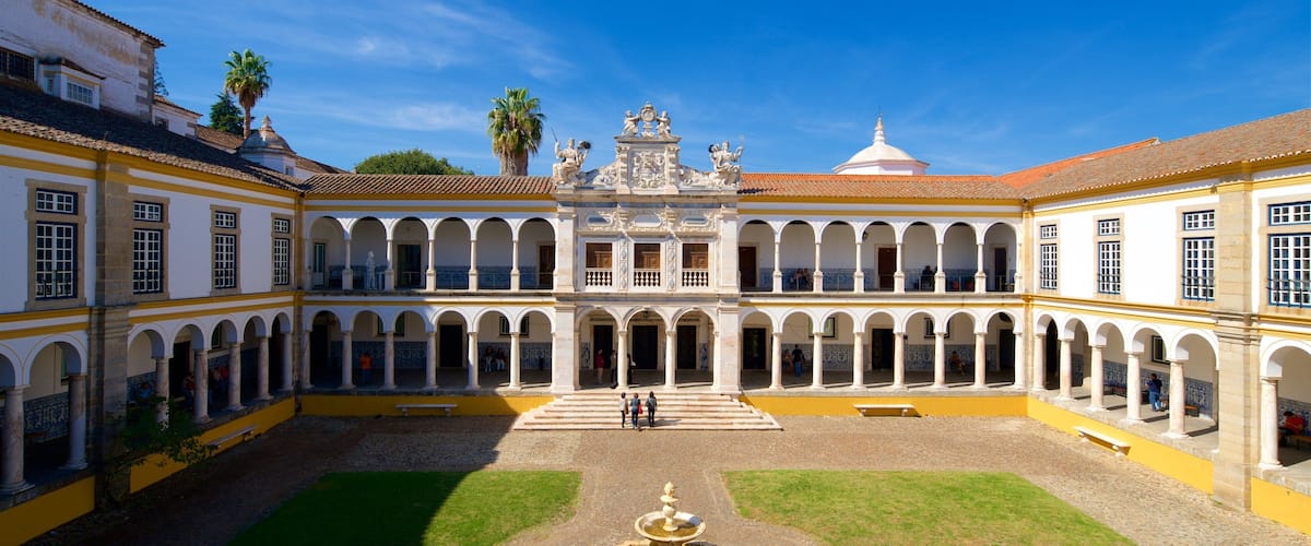 University of Évora featuring a fountain and heritage elements