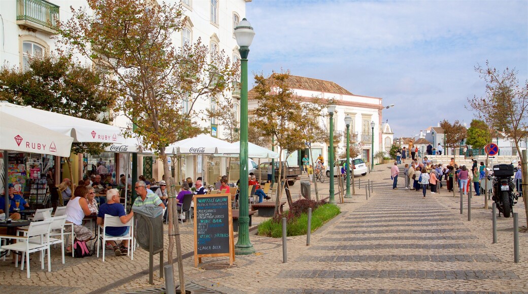 Praca da Republica which includes outdoor eating as well as a small group of people
