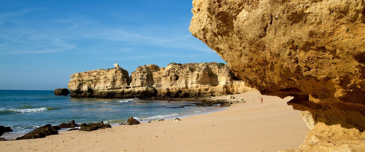 Sao Rafael Beach which includes general coastal views, rocky coastline and a beach