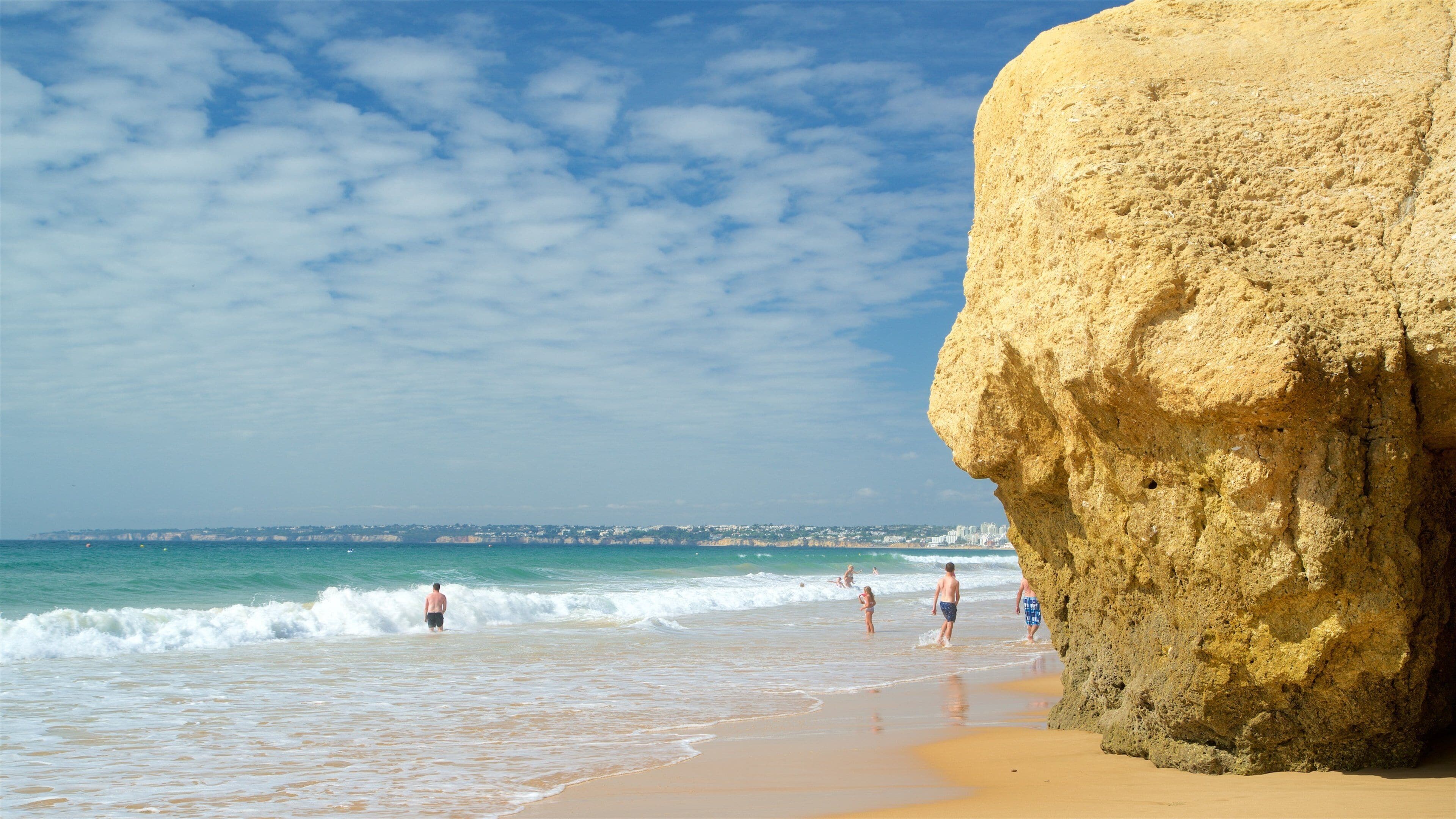 Gale Beach which includes general coastal views, rocky coastline and swimming