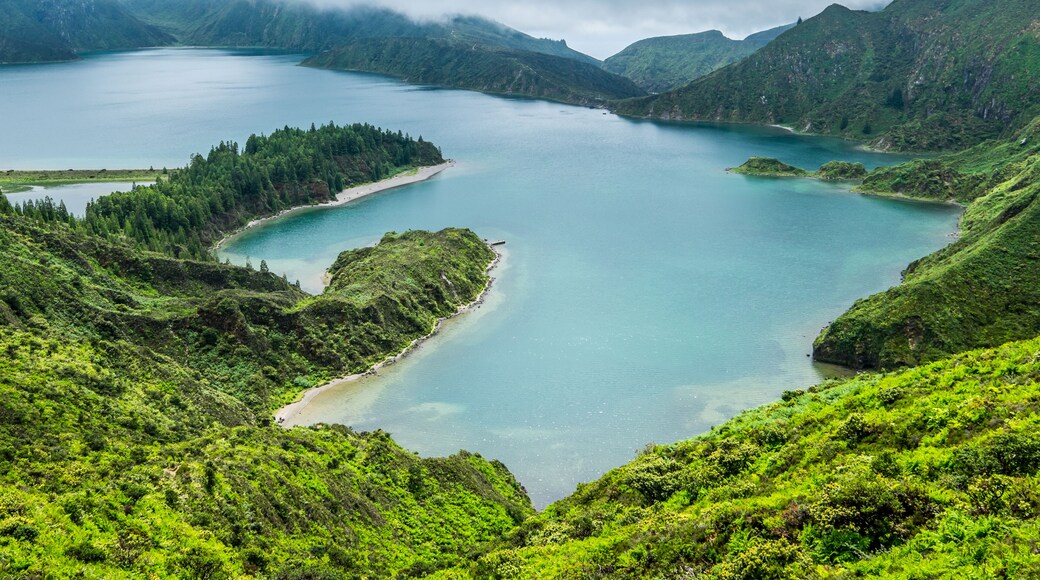 Lagoa do Fogo, a volcanic lake in Sao Miguel, Azores under the dramatic clouds