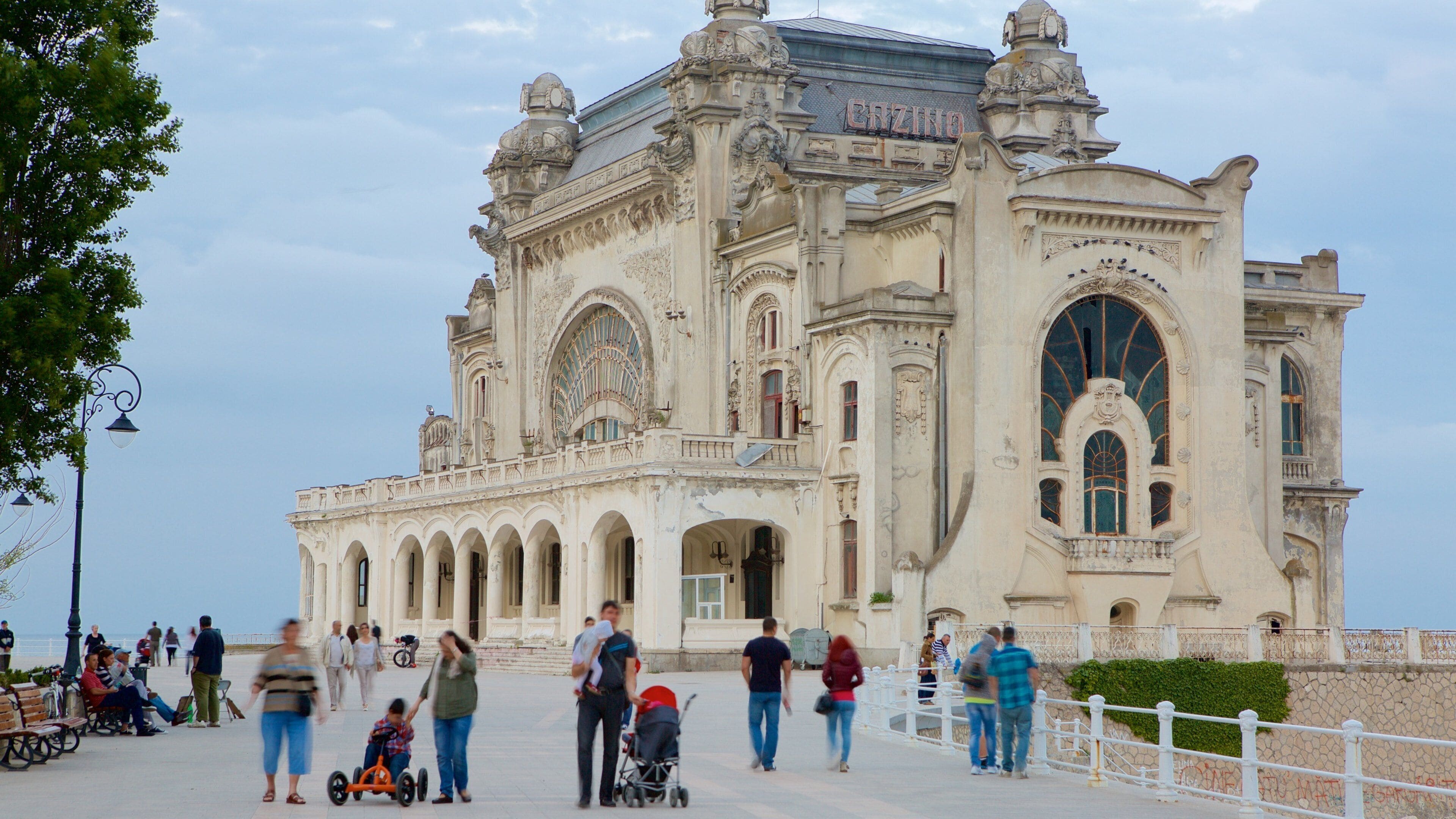 Constanta Casino which includes heritage architecture as well as a large group of people