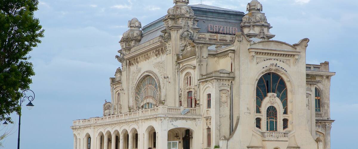 Constanta Casino showing heritage architecture as well as a large group of people