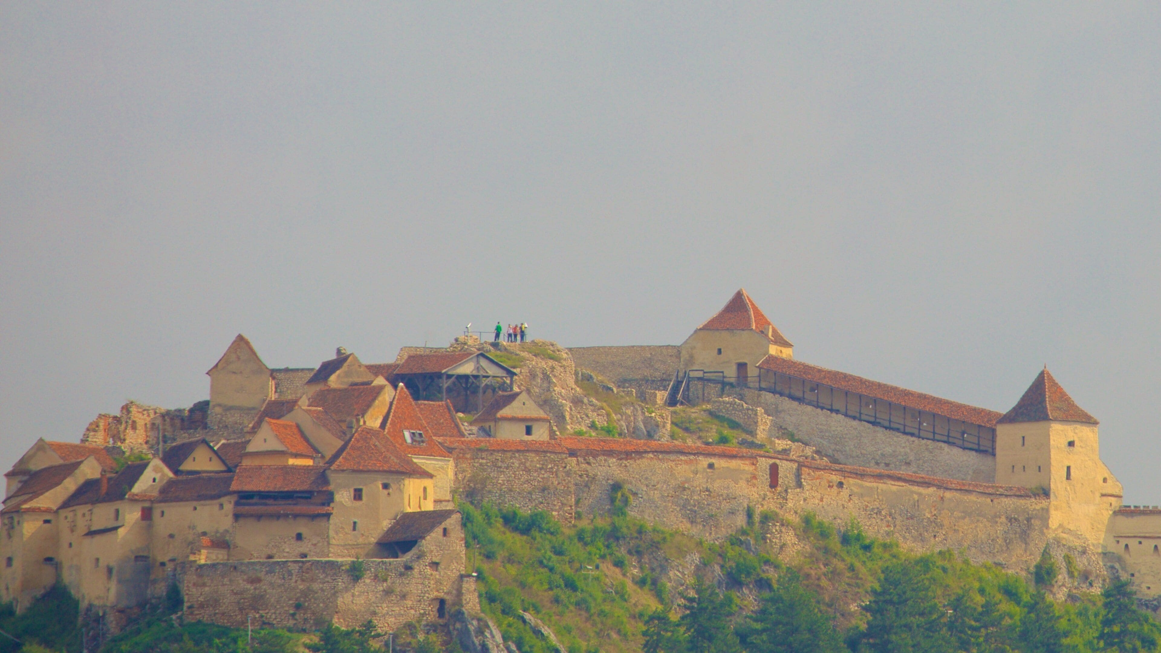 Rasnov Fortress showing a castle and heritage architecture