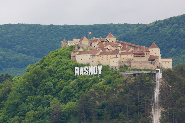 Rasnov Fortress which includes chateau or palace and signage