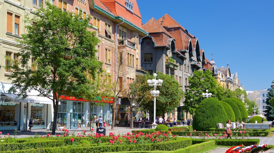 Piata Operei which includes heritage architecture and a garden