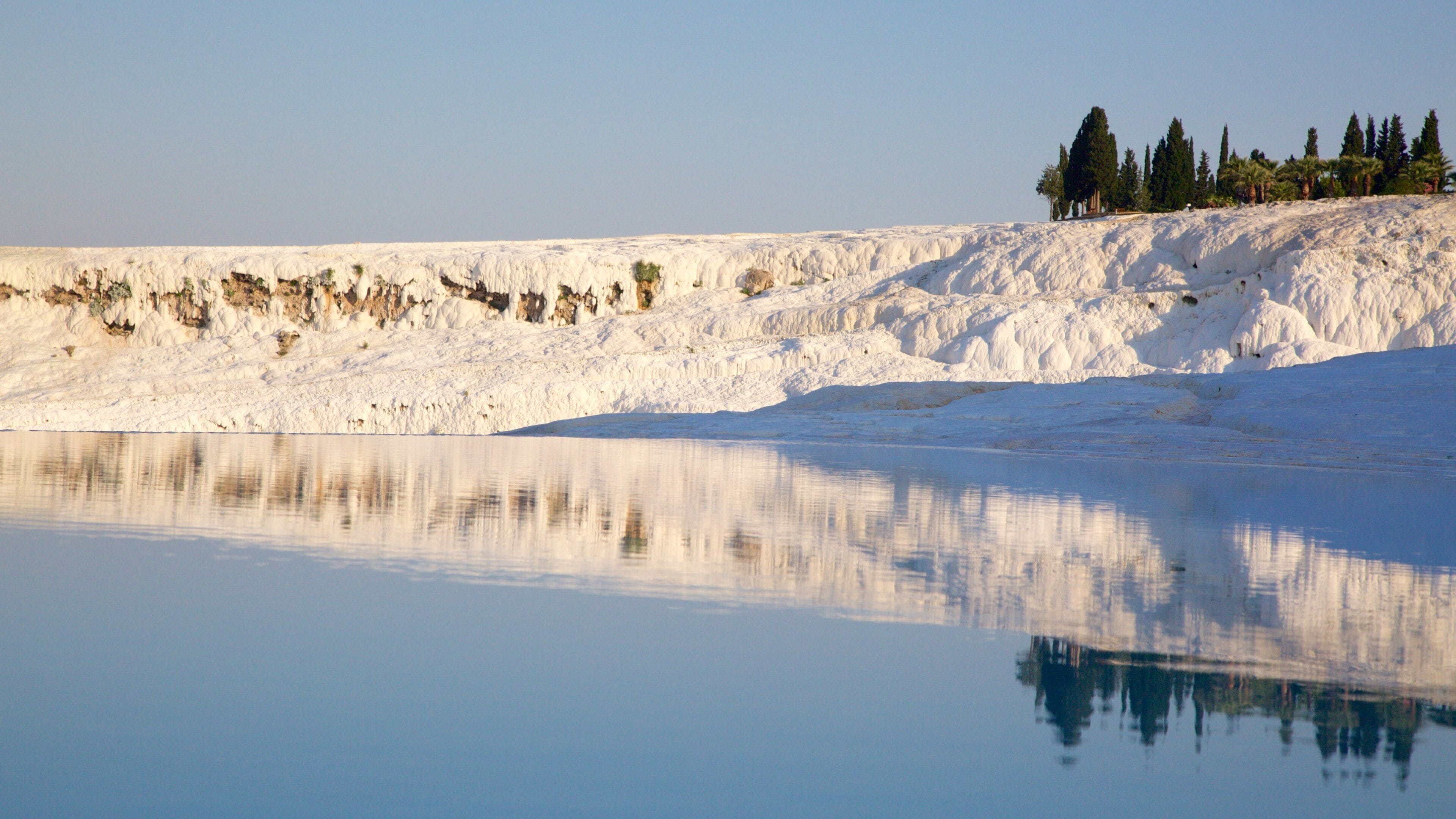Turkey which includes snow and a lake or waterhole