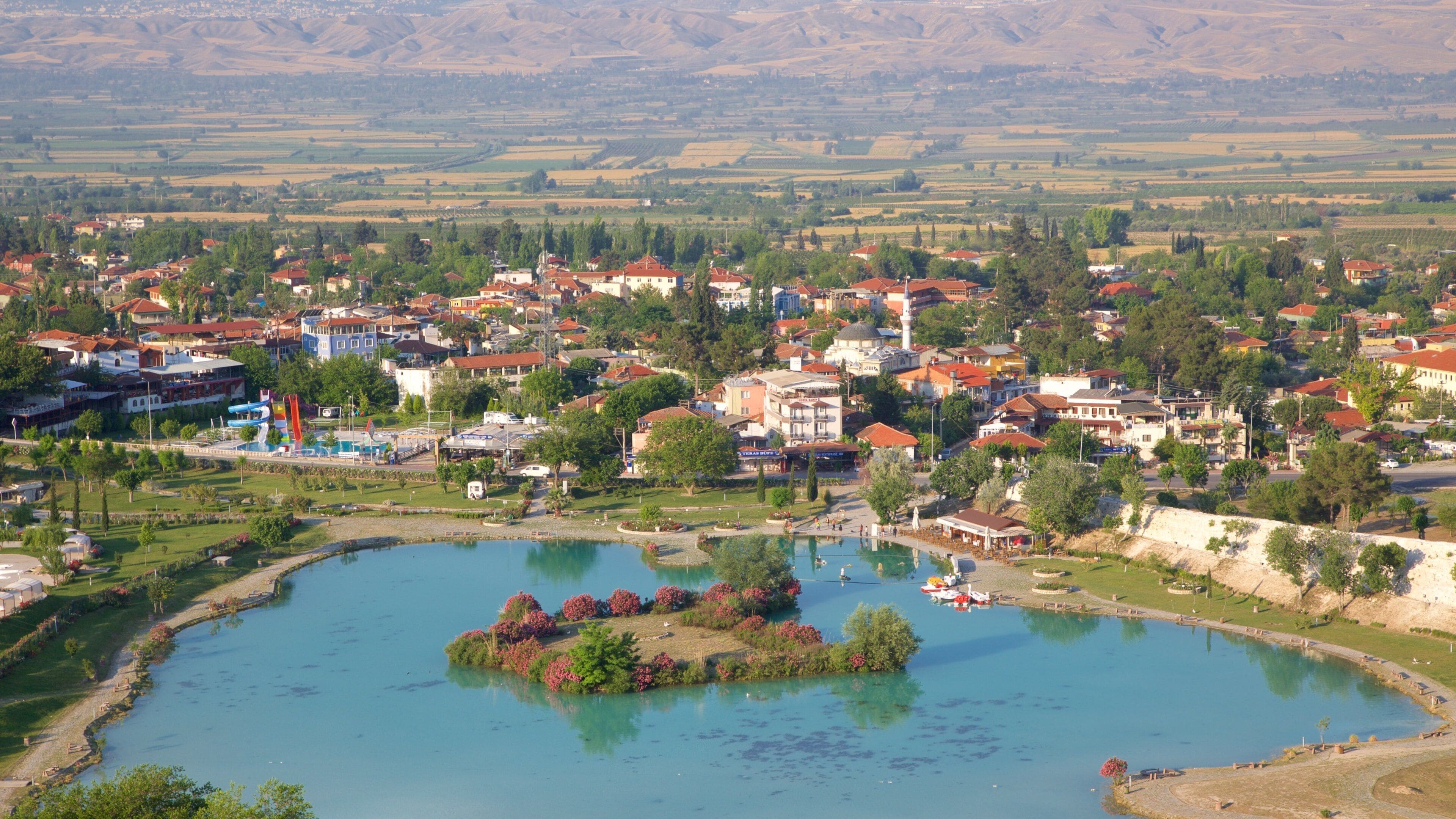 Turkey featuring a small town or village, a pond and landscape views