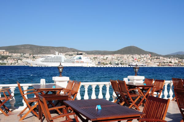 Perfect dinner spot on a terrace in Kusadasi Turkey with a beautiful cruise ship in the background