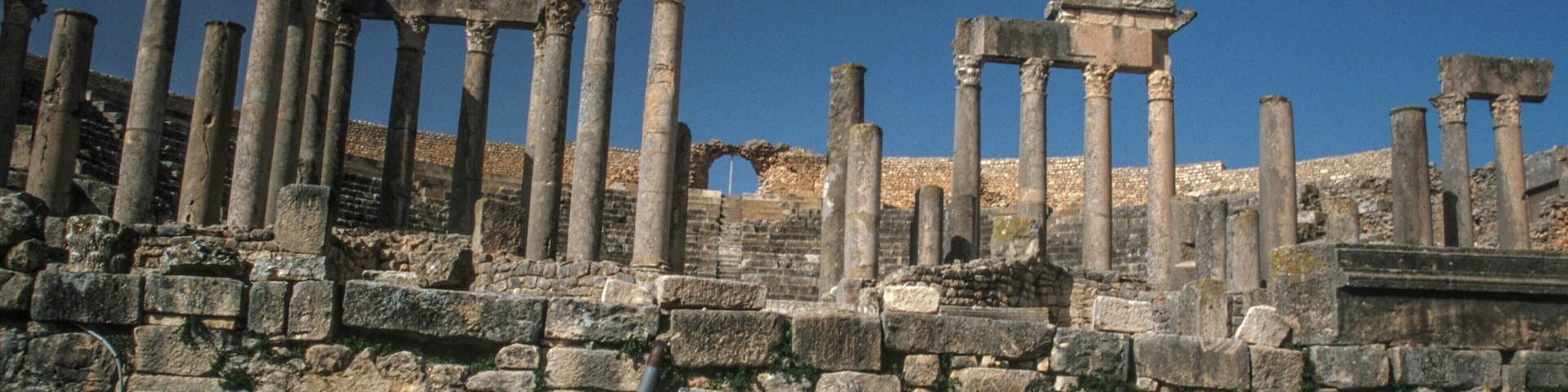 #Detail
Inscription, Roman theatre, in the Romano Berber city of Dougga.
A Unesco world heritage site, and the best preserved of all such sites, in North Africa.
Due mainly to it's  remote location.