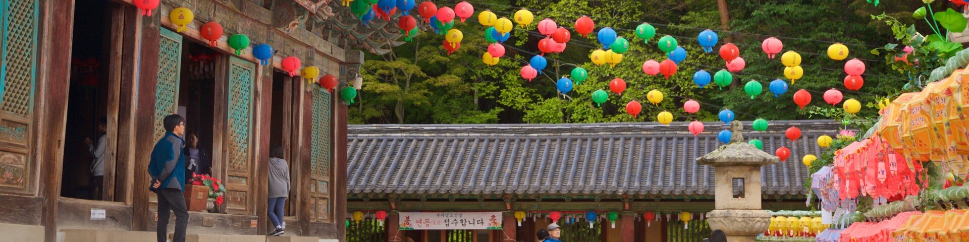 Bulguksa Temple featuring a temple or place of worship and heritage elements as well as a small group of people