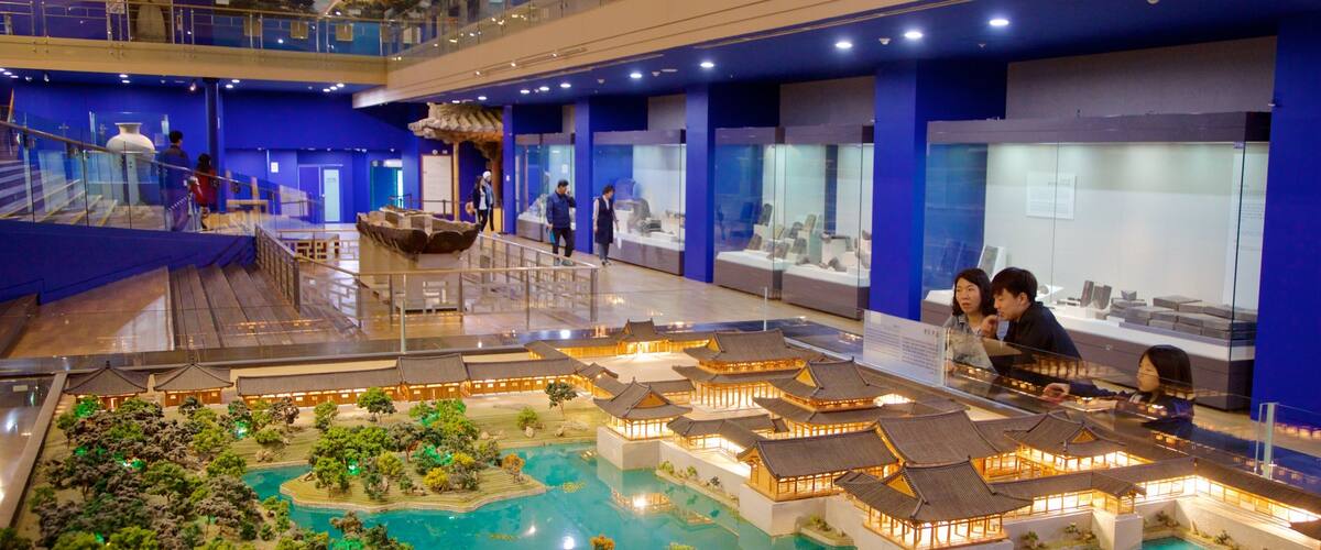 Gyeongju National Museum featuring interior views as well as a family