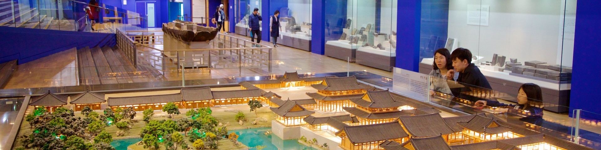 Gyeongju National Museum featuring interior views as well as a family