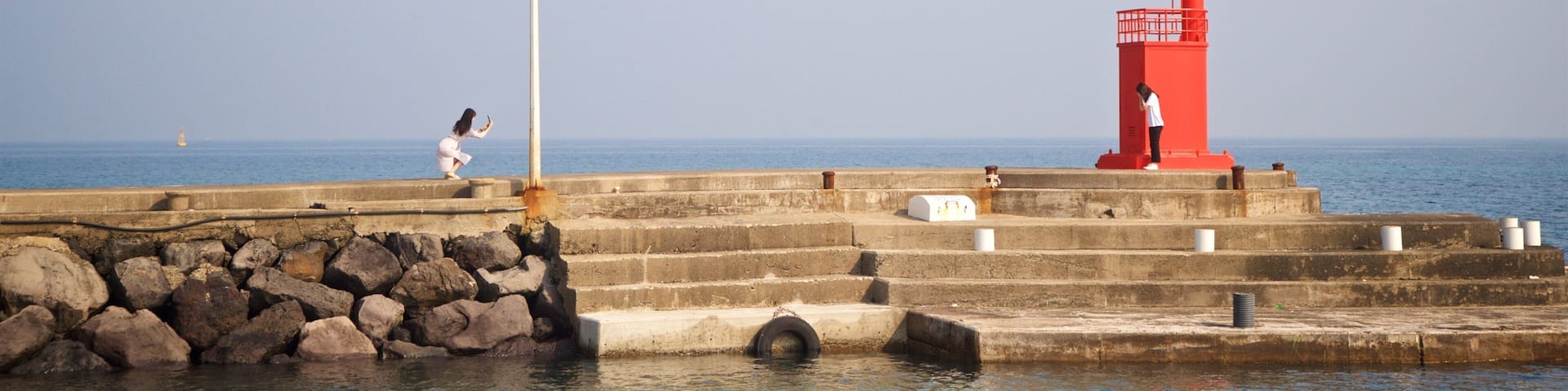 Iho Beach featuring general coastal views as well as a couple