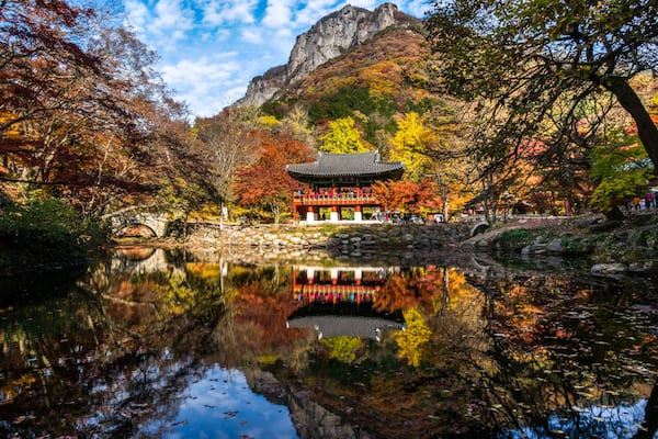 Reflections of Baegyangsa (a traditional korean temple) in South Korea during autumn.; Shutterstock ID 700482055; Purchase Order: -