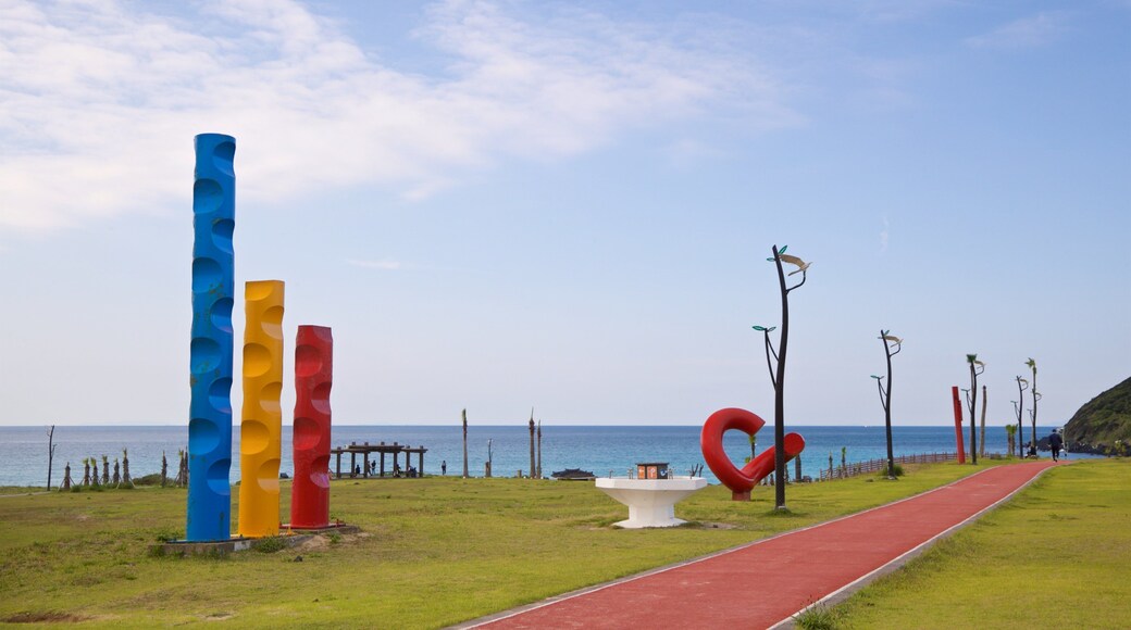 St Maarten and St Martin showing outdoor art, a garden and general coastal views