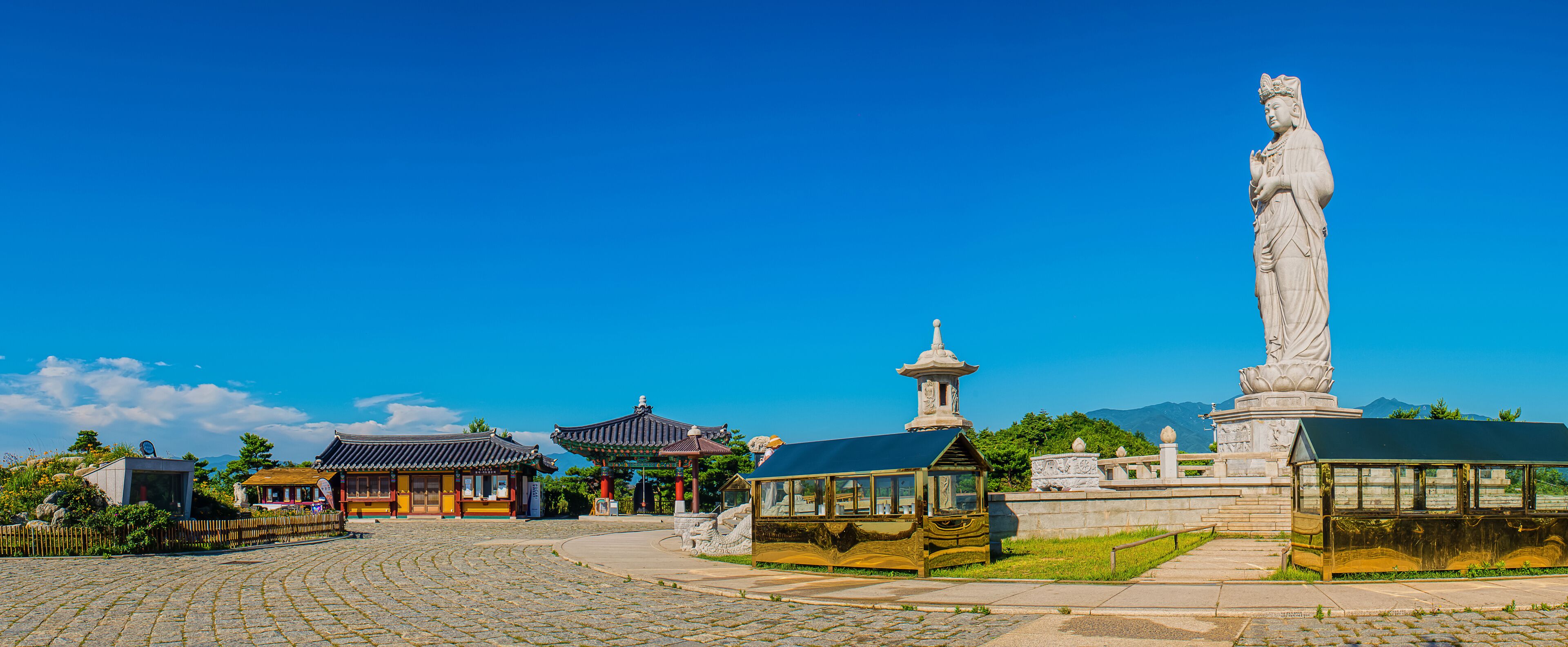 A stone statue of Buddha called Haesugwaneumsang. Panorama
