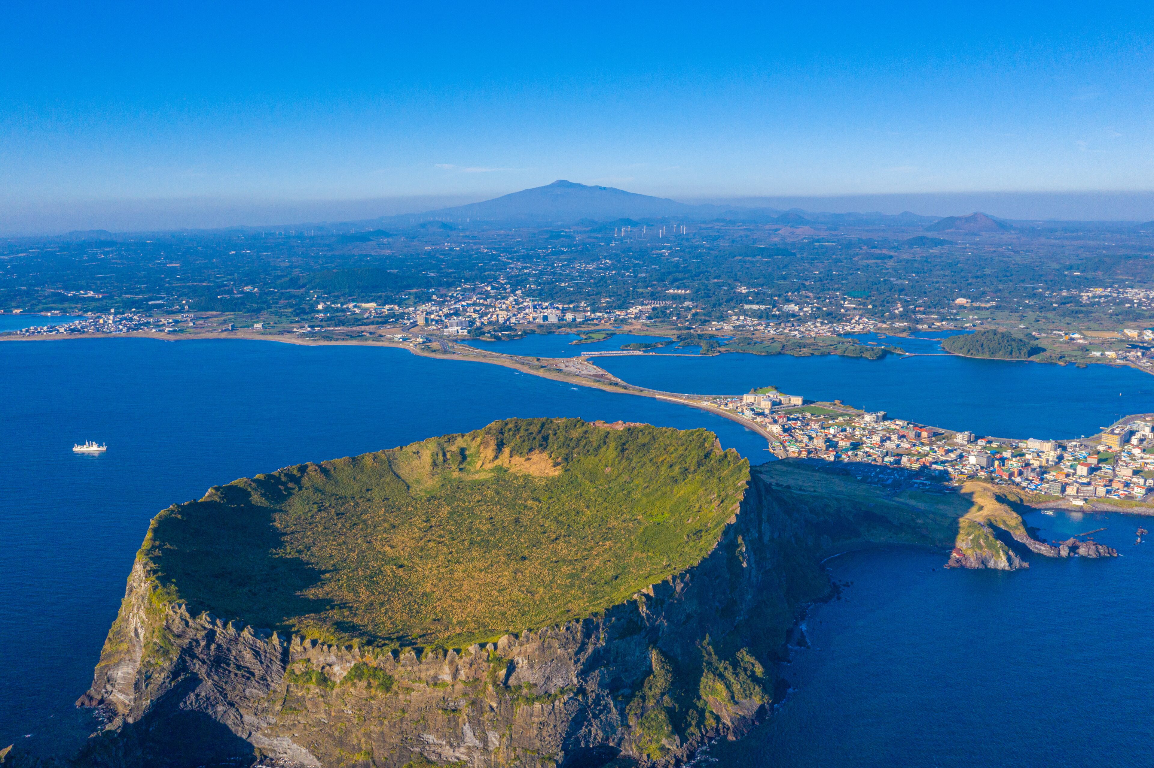 Sunrise view of Seongsan Ilchulbong known as sunrise peak at Jeju Island, Republic of Korea