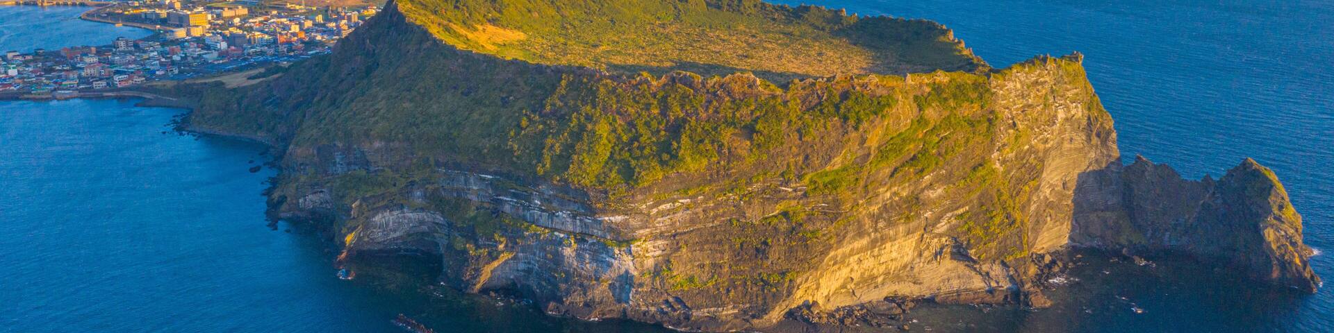 Sunrise view of Seongsan Ilchulbong known as sunrise peak at Jeju Island, Republic of Korea