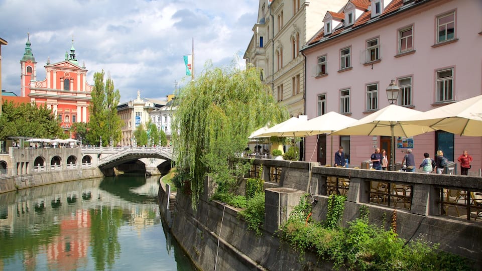 Triple Bridge featuring a river or creek, a bridge and a city