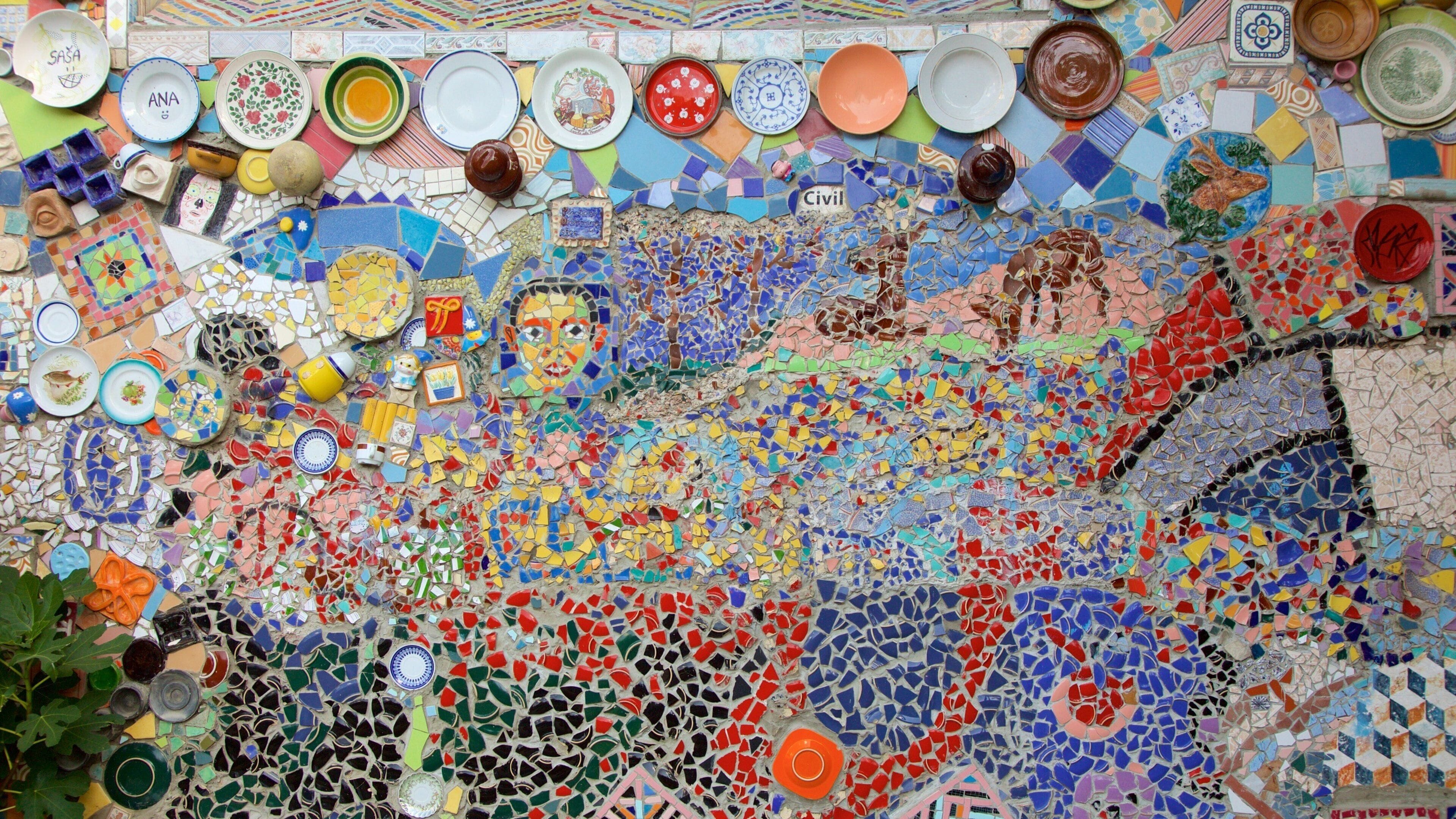 Metelkova which includes a small town or village and outdoor art