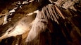 A cave with stalactites and stalagmites.