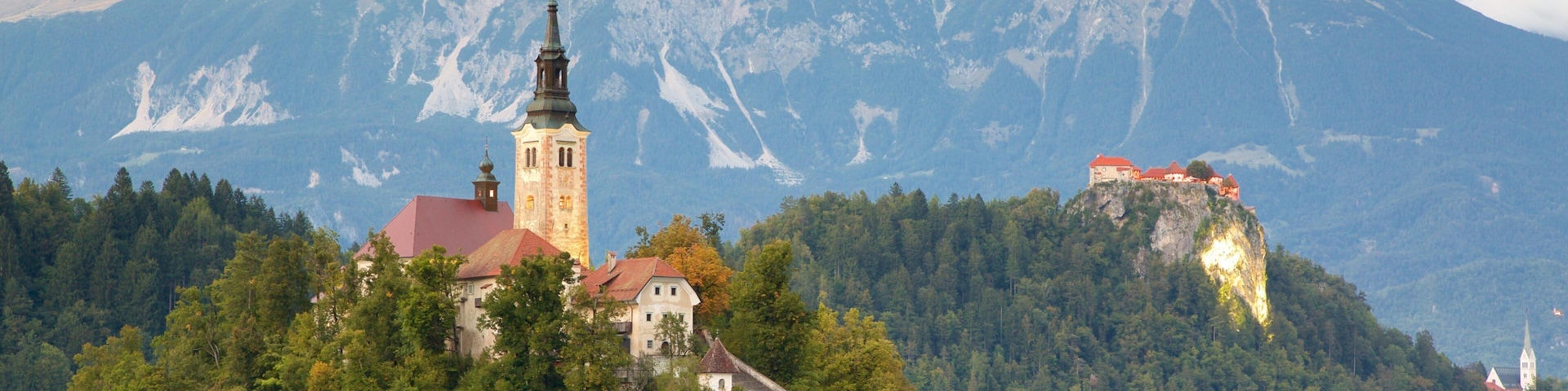 Lake Bled showing landscape views, a lake or waterhole and mountains