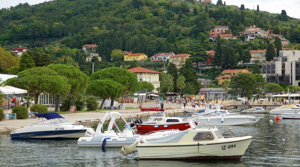 Portoroz Beach showing a coastal town, a marina and boating