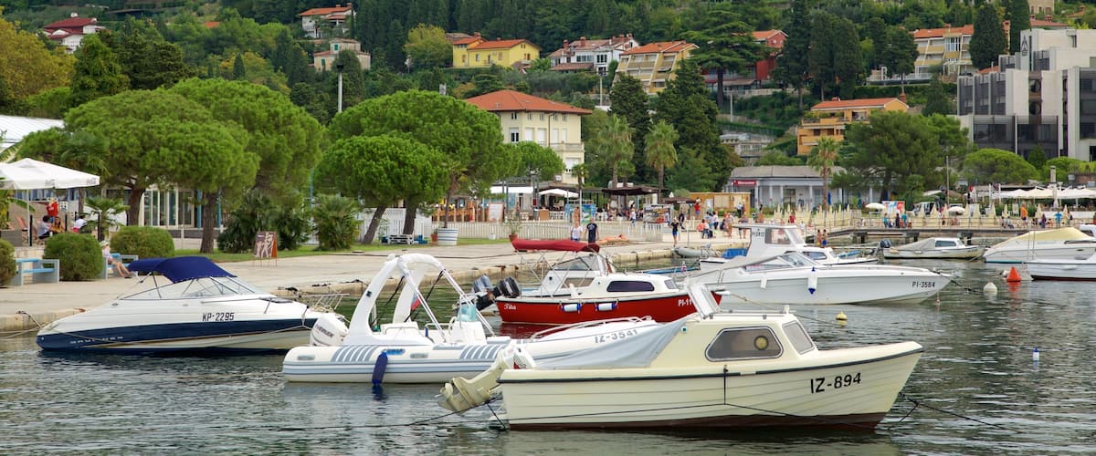 Portoroz Beach showing a coastal town, a marina and boating