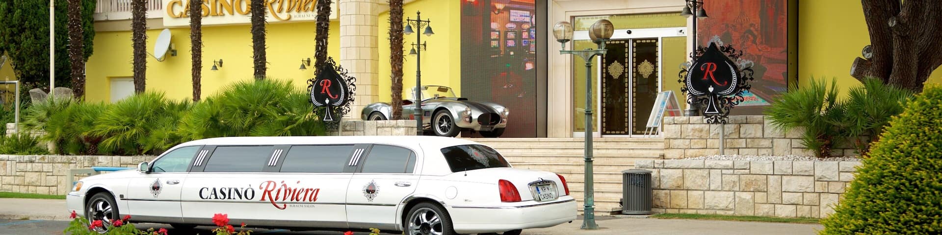 Portoroz Beach which includes a luxury hotel or resort and a coastal town