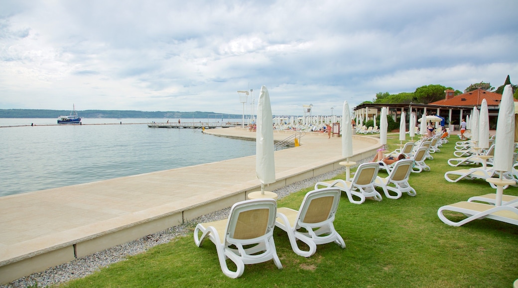 Portoroz Beach which includes general coastal views, a coastal town and boating