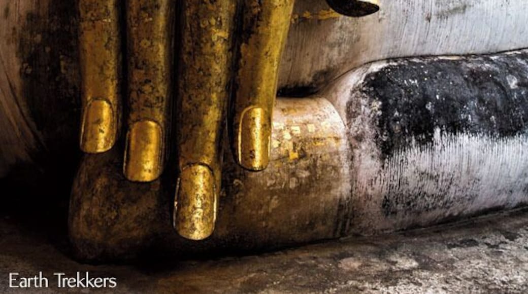 One of the highlights of visiting Sukhothai, Thailand is seeing the giant sitting Buddha at Wat Si Chum. You might not be able to tell from this photo, but this hand is so much taller than we are.
See more from Sukhothai: http://www.earthtrekkers.com/ayutthaya-and-sukhothai-ancient-cities-of-siam/
