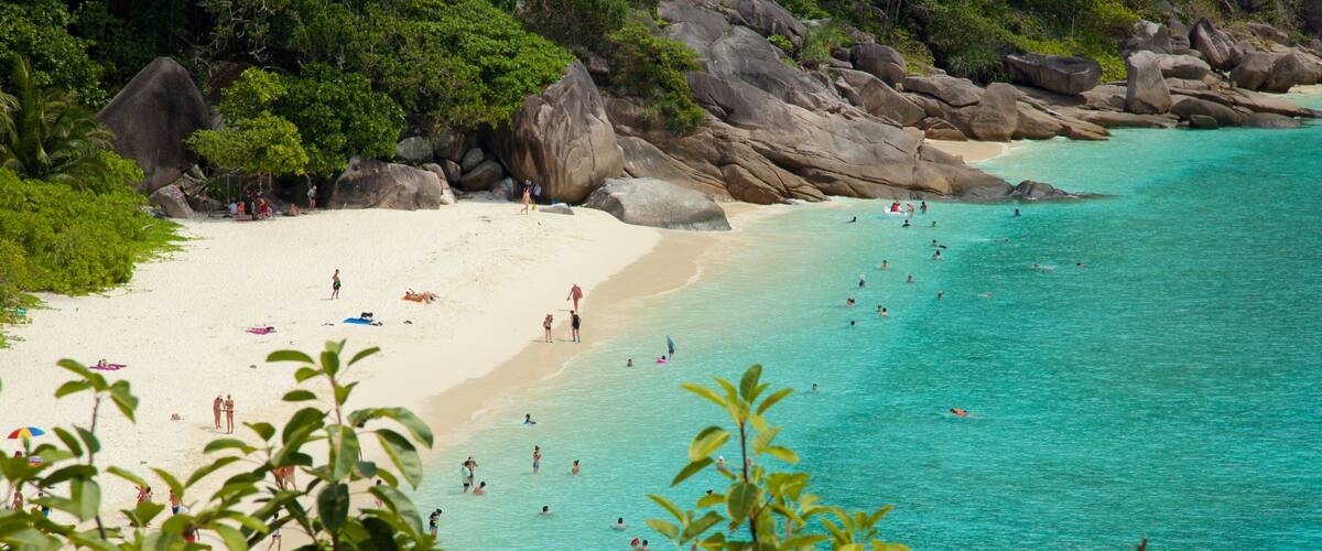 Ko Similan National Park which includes a sandy beach and rugged coastline