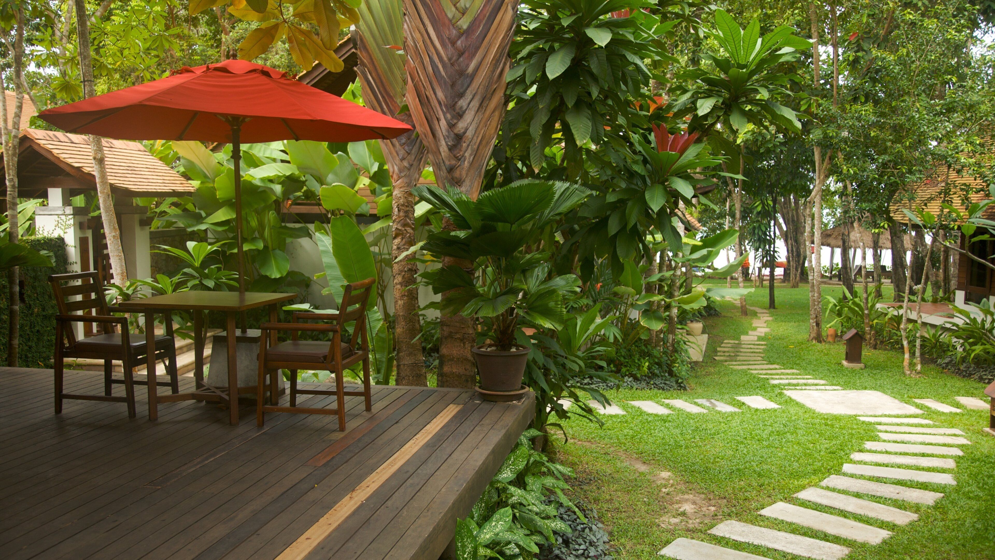 Ao Phra Nang Beach which includes a garden and a luxury hotel or resort