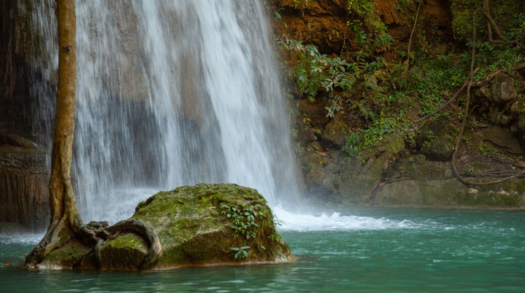 Erawan National Park featuring a cascade and a lake or waterhole