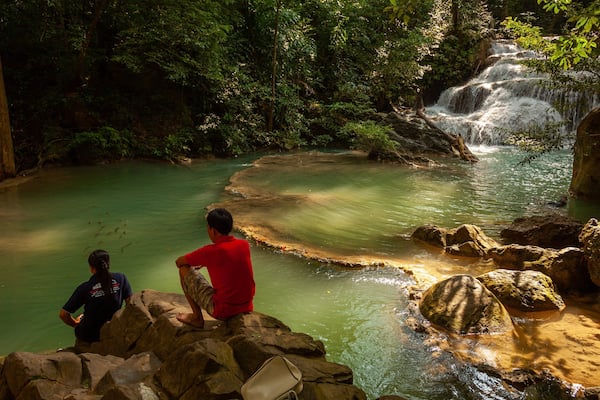 Erawan National Park showing a river or creek as well as a couple