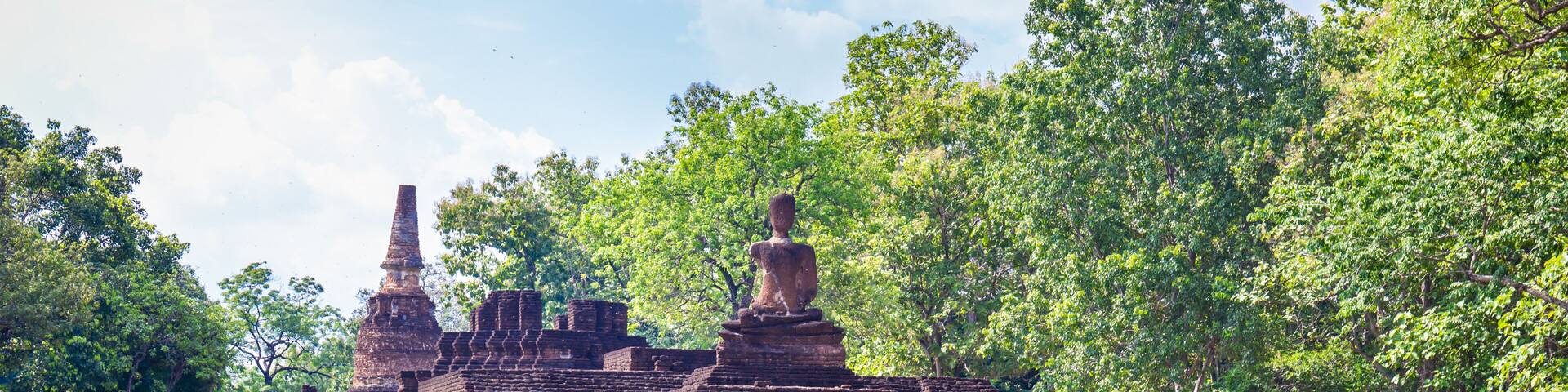 Landmark of Buddha image made of ancient bricks in the Kamphaeng Phet Historical Park, Thailand.