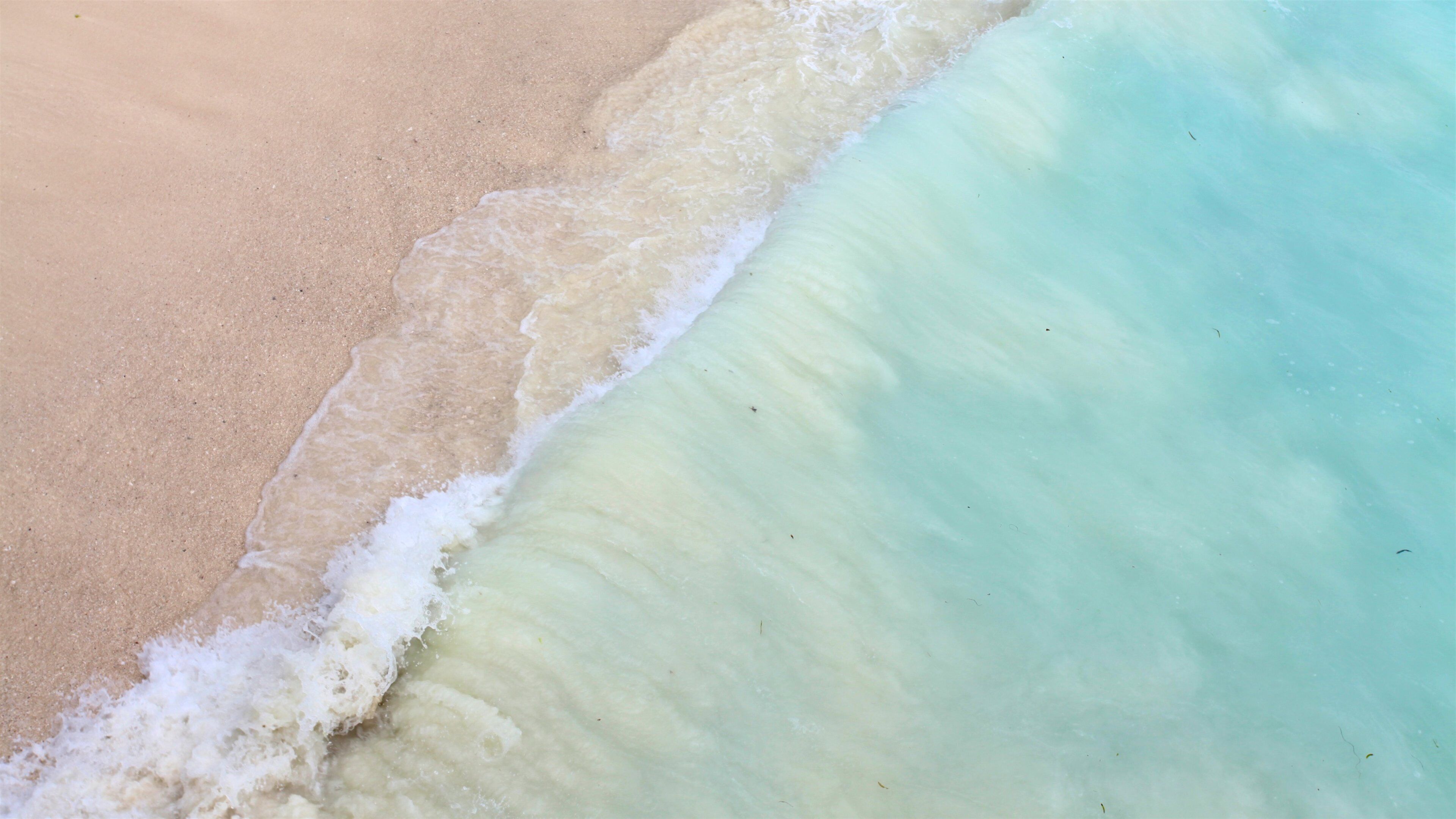 Nungwi Beach showing a sandy beach and waves