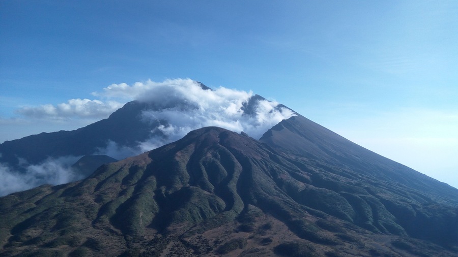 Mount Meru is a dormant stratovolcano located 70 kilometers west of Mount Kilimanjaro in the country of Tanzania. At a height of 4,562.13 meters, it is visible from Mount Kilimanjaro on a clear day, and is the fifth-highest mountain in Africa, dependent on definition