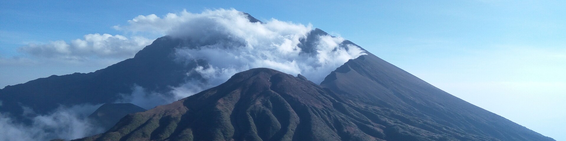 Mount Meru is a dormant stratovolcano located 70 kilometers west of Mount Kilimanjaro in the country of Tanzania. At a height of 4,562.13 meters, it is visible from Mount Kilimanjaro on a clear day, and is the fifth-highest mountain in Africa, dependent on definition