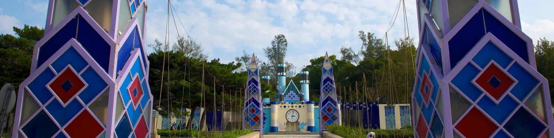 A colorful entrance with geometric patterns and a clock in the center.