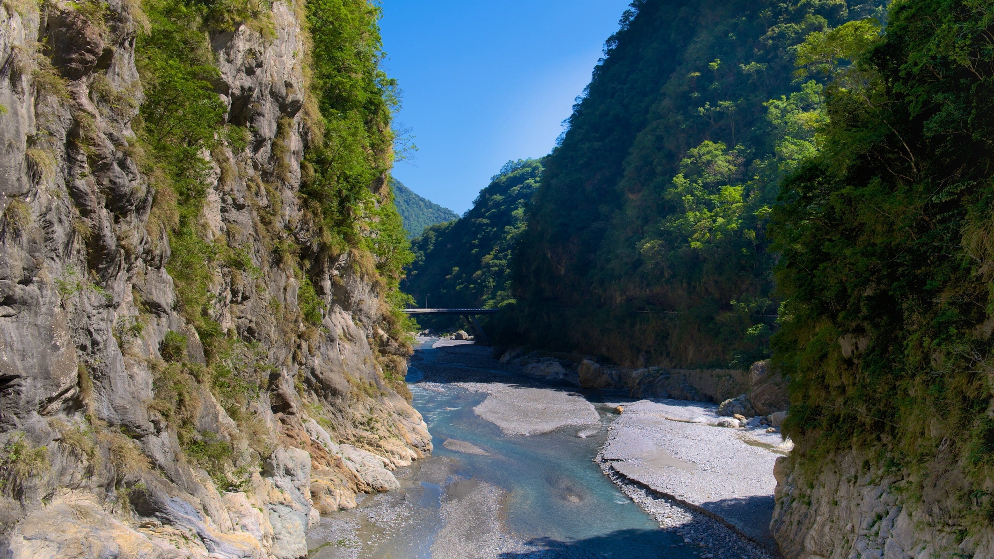 Taroko National Park which includes tranquil scenes and a river or creek
