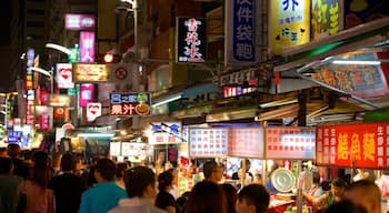 Liuhe Night Market showing a city, night scenes and markets