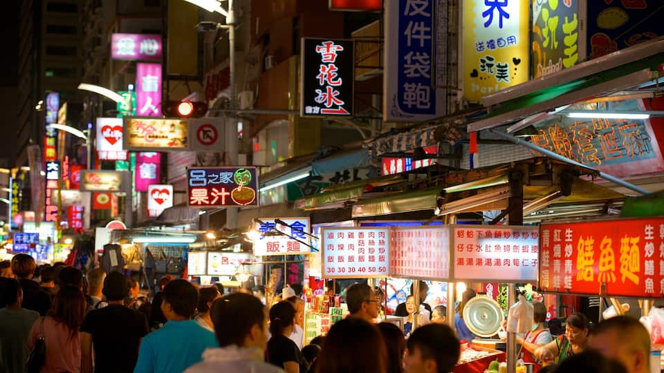 Liuhe Night Market showing a city, night scenes and markets