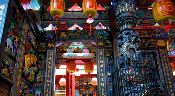 Dianji Temple featuring a temple or place of worship and heritage elements